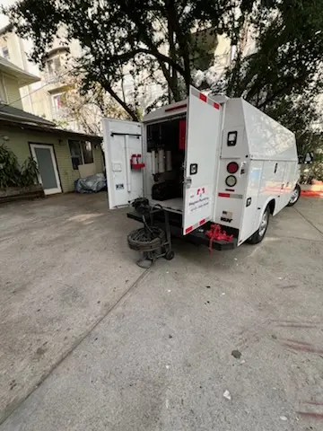 Magnet Plumbing service vehicle on-site for Grease Trap Cleaning in Jupiter Village
